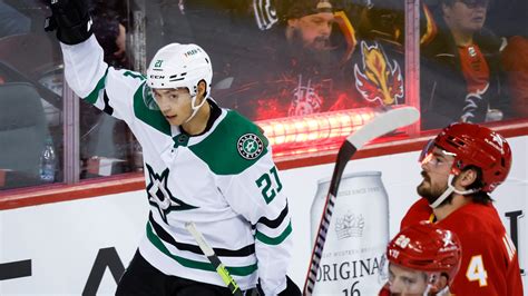 Robertson, Dadonov and Marchment score in 2nd period and Stars hold on to beat Flames 4-3